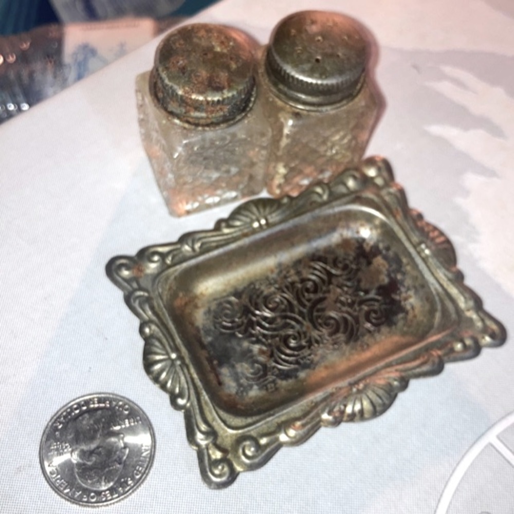 Miniature salt and pepper shakers silver plated